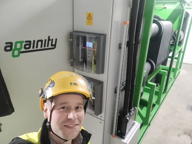 Fredrik Ahlström beside the Againity ORC system in Kannus
